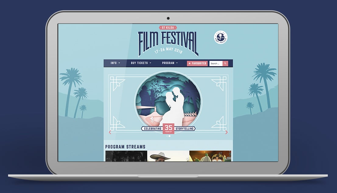 Laptop displays the festival homepage